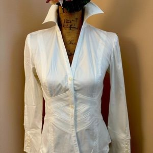 Cotton with mild stretch and beautiful seaming details front and back.